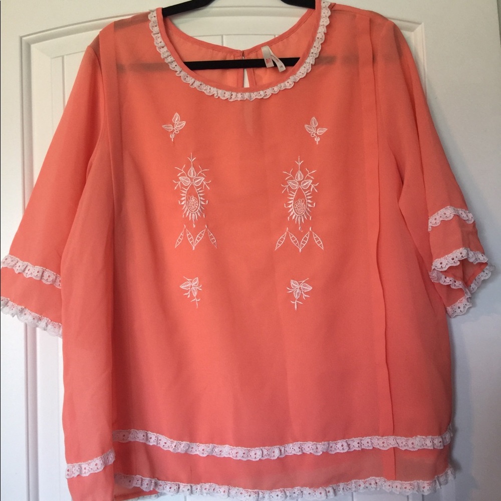 Peach blouse with lace details